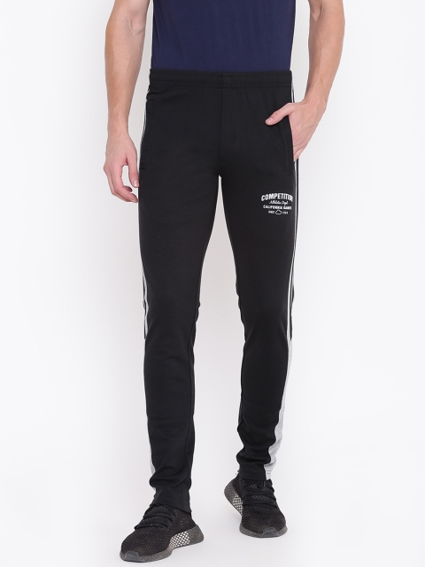 

Sweet Dreams Men Black Solid Track Pants