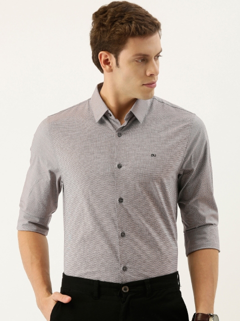 

Calvin Klein Jeans Men Black & White Slim Fit Self Design Smart Casual Shirt
