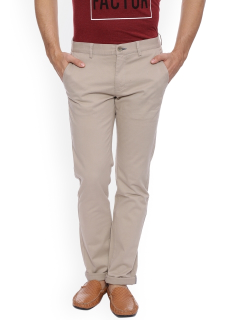

Basics Men Beige Tapered Fit Solid Chinos