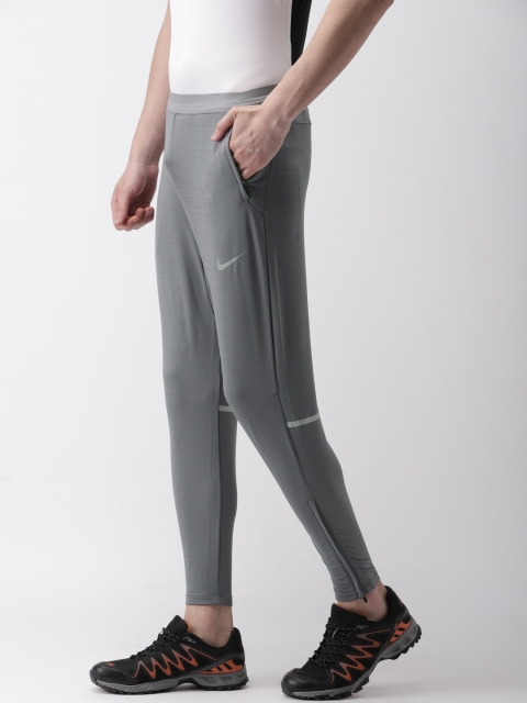 

Nike Men Grey Solid AS PHNM Track Pants