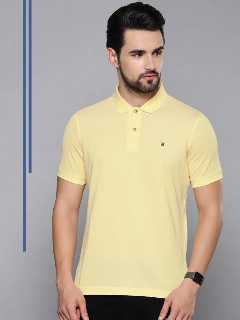 

Louis Philippe Sport Men Yellow Solid Polo Collar T-shirt
