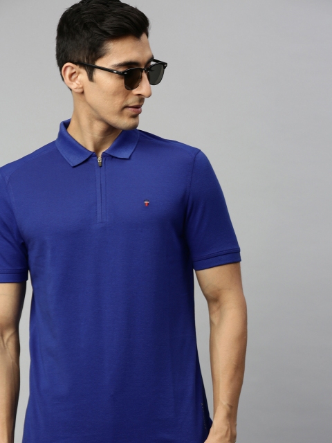 

Louis Philippe Sport Men Blue Solid Slim Fit Polo T-shirt With Back Printed Detailing