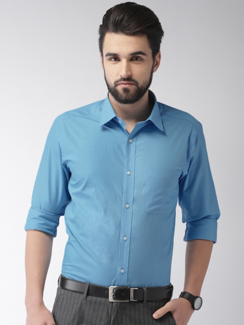

Raymond Men Blue Slim Fit Solid Formal Shirt
