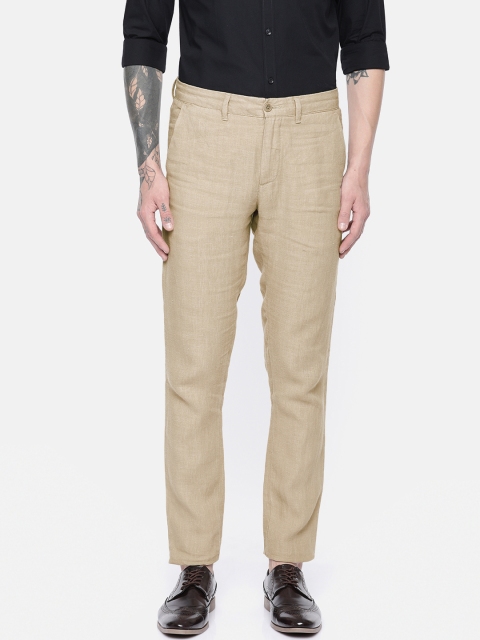 

Jack & Jones Men Beige Marco Slim Fit Solid Regular Trousers