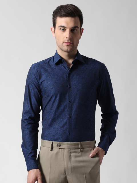 

Peter England Men Blue Slim Fit Self Design Formal Shirt