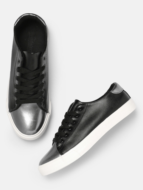 

Roadster Women Black & Silver-Toned Solid Sneakers