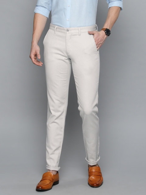 

Louis Philippe Sport Men Grey & White Slim Fit Self-Design Regular Trousers