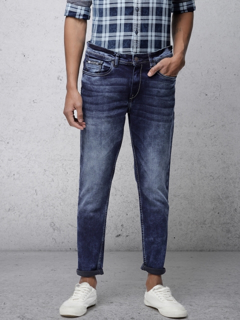 

Ecko Unltd Men Blue Tapered Fit Mid-Rise Clean Look Stretchable Jeans