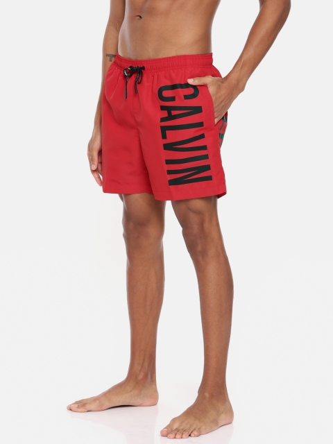 

Calvin Klein Underwear Men Red & Black Printed Swim Shorts KM00150622