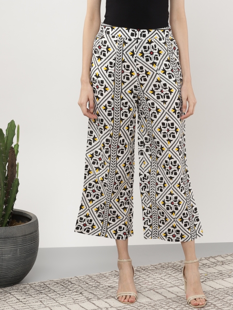 

Sangria Women White & Black Printed Straight Palazzos