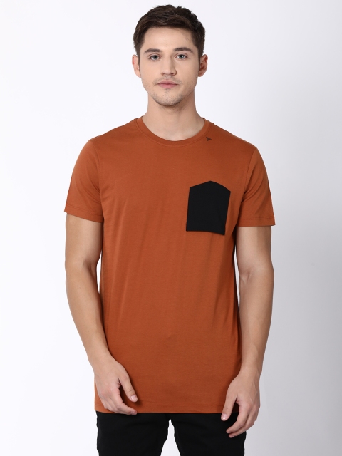 

Blue Saint Men Rust Solid Round Neck T-shirt