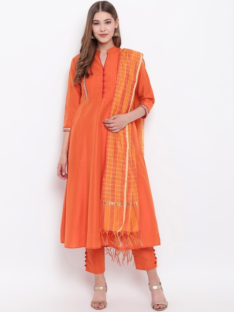 

Shakumbhari Women Orange & Solid Kurta with Trousers & Dupatta