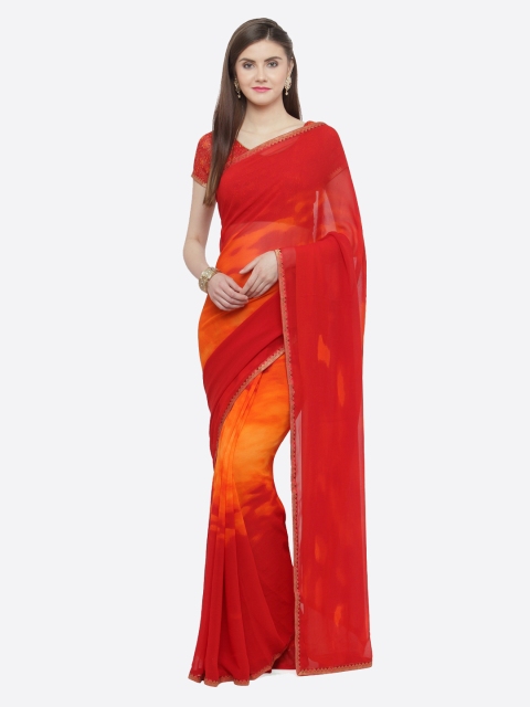 

Shaily Red & Orange Pure Georgette Dyed Saree