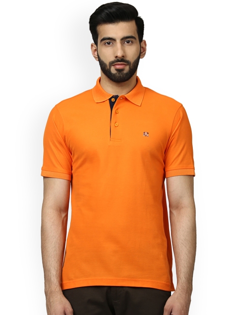 

Raymond Men Orange Solid Polo Collar T-shirt