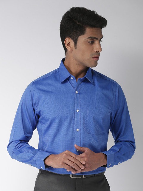 

Raymond Men Blue Solid Slim Fit Shirt