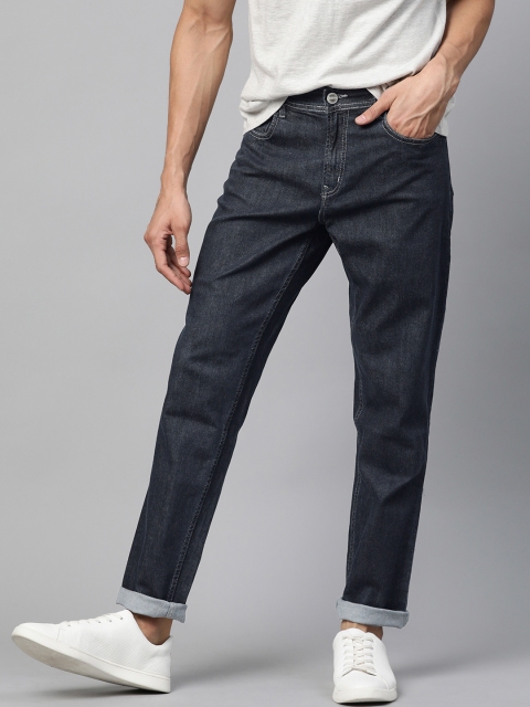 

Mast & Harbour Men Navy Blue Carrot Fit Mid-Rise Clean Look Stretchable Jeans