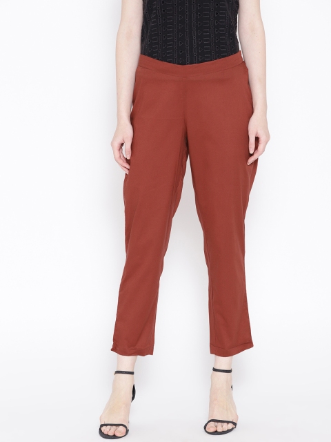 

Ayaany Women Rust Red Slim Fit Solid Regular Trousers