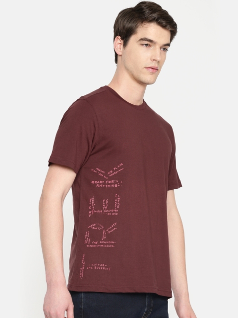 

Wildcraft Men Maroon Solid Round Neck Pure Cotton T-shirt