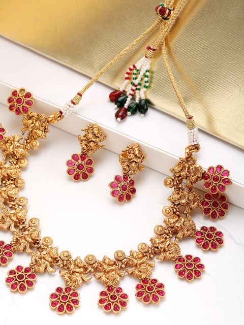 

Melani Borsa Pink Gold-Plated Stone-Studded Lord Ganesha Textured Jewellery Set