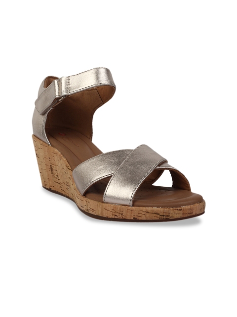 

Clarks Women Gold-Toned Solid Wedges