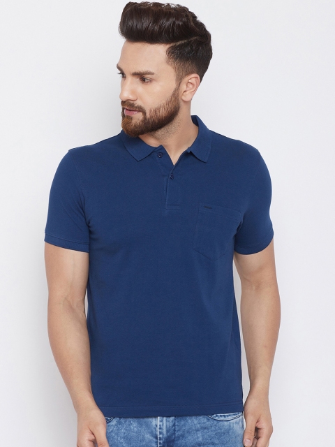 

Okane Men Blue Solid Polo Collar T-shirt