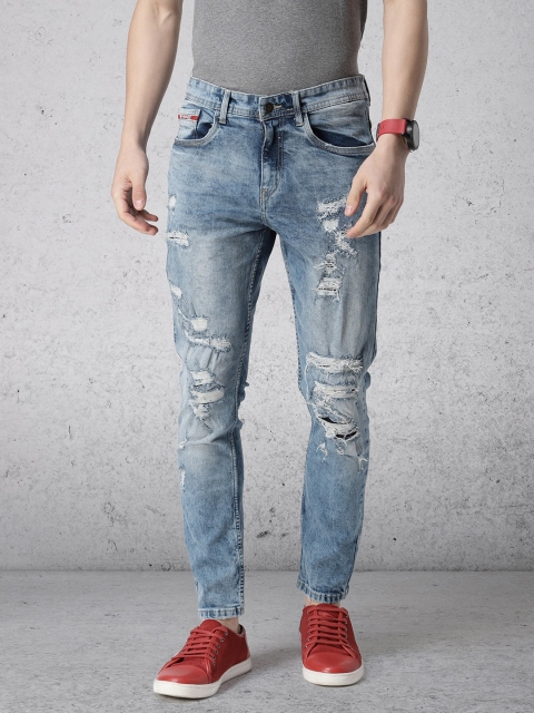 

Ecko Unltd Men Blue Tapered Fit Mid-Rise Highly Distressed Stretchable Jeans