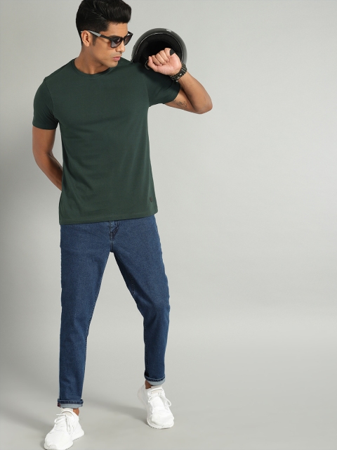 

The Roadster Lifestyle Co Men Green Solid Round Neck Pure Cotton T-shirt