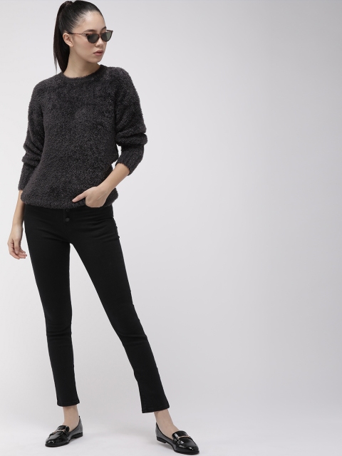 

Levis Women Black Solid Sweater
