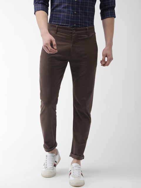 

Levis Men Brown Regular Tapered Fit Solid Chinos 502