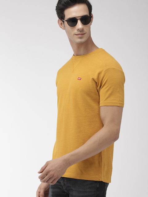

Levis Men Mustard Yellow Solid Round Neck T-shirt
