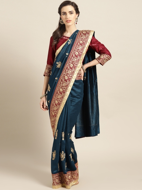 

MANOHARI Teal Blue & Golden Embroidered Saree