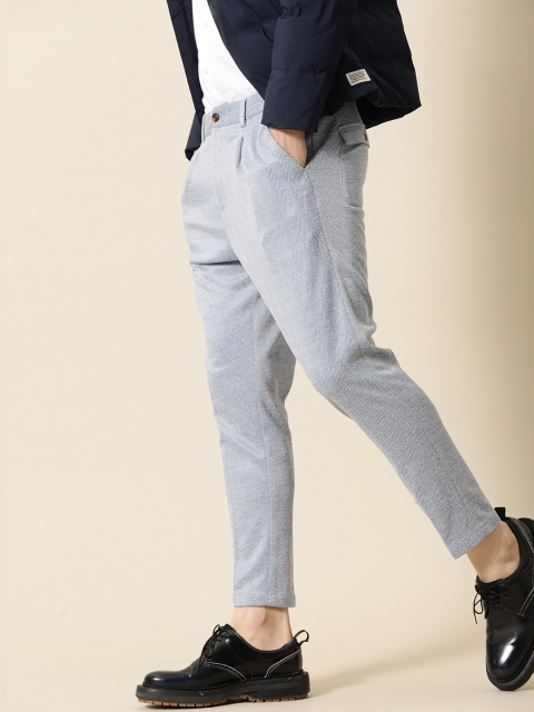 

Mr Bowerbird Men Blue & White Tapered Fit Self Design Regular Trousers
