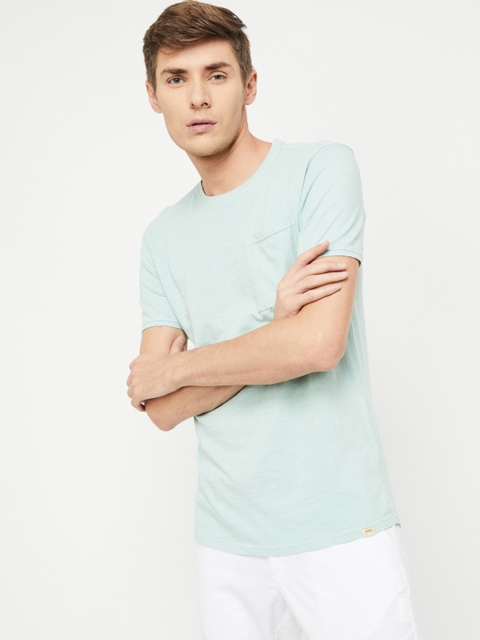 

Forca by Lifestyle Men Green Solid Round Neck T-shirt