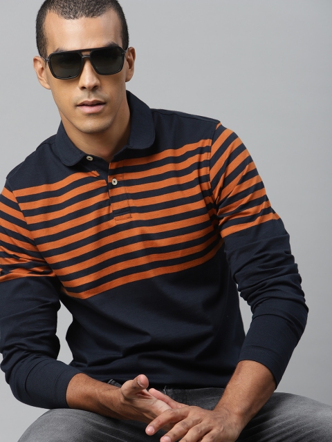 

Roadster Men Navy Blue Cotton Striped Polo Collar T-shirt
