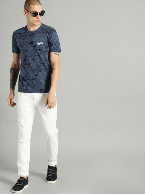 

The Roadster Lifestyle Co Men Navy Blue Printed Round Neck Pure Cotton T-shirt