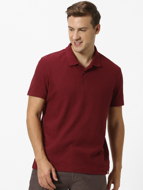 

Celio Men Burgundy Solid Polo Collar T-shirt