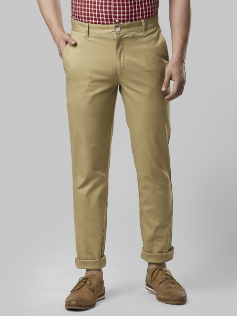 

Raymond Men Beige Slim Fit Solid Regular Trousers