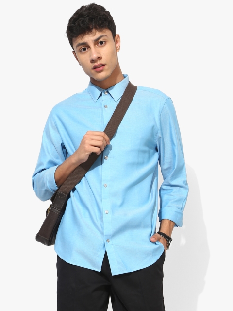 

Blue Solid Regular Fit Casual Shirt