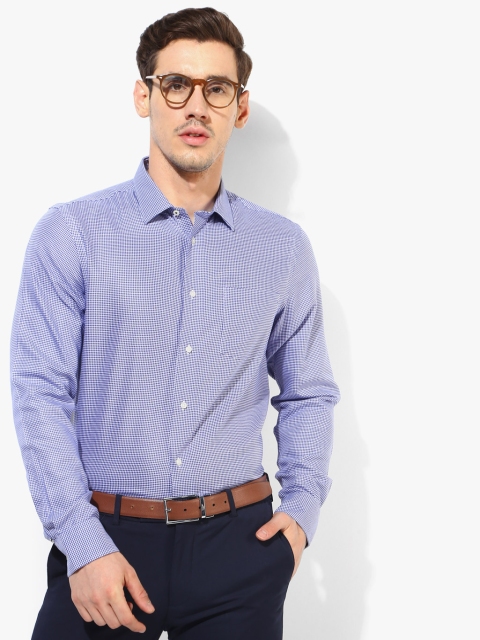 

Light Blue Solid Regular Fit Formal Shirt