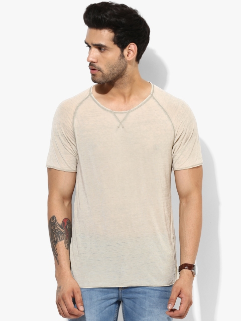 

Beige Solid Regular Fit Round Neck T-Shirt