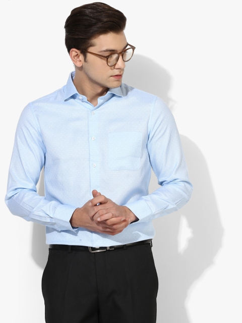 

Blue Solid Regular Fit Formal Shirt