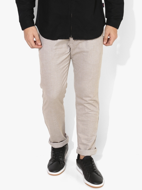 

Beige Self Design Slim Fit Chinos