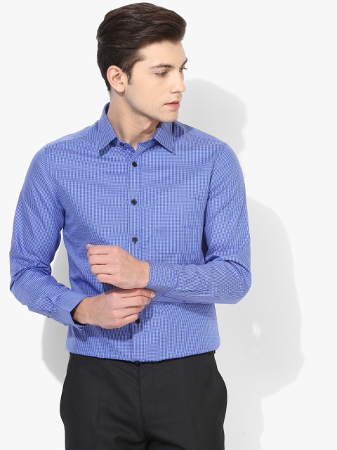

Blue Solid Regular Fit Formal Shirt