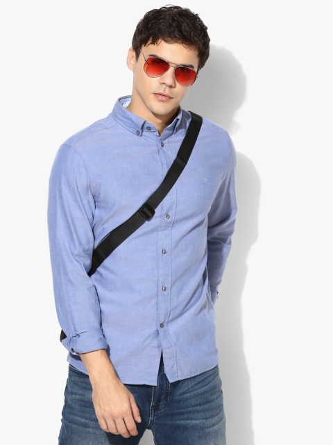 

Blue Solid Slim Fit Casual Shirt