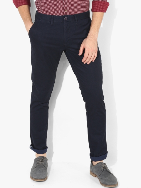 

Navy Blue Self Design Slim Fit Chinos