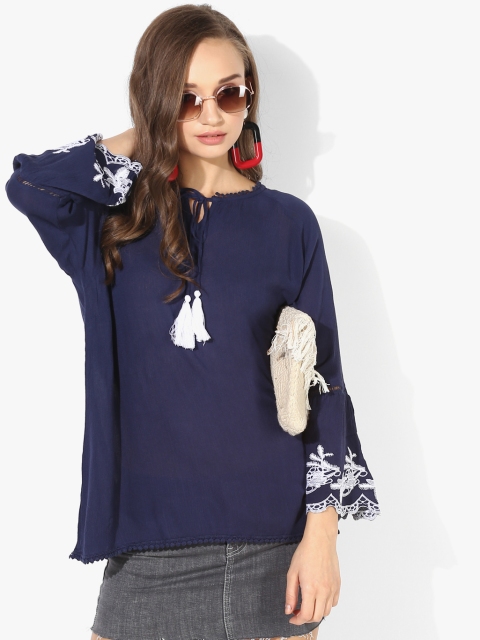 

Navy Blue Top In Crinkle Fabric With Heavy Embroired Sleeves Having Tie Up At Neck In Constast Tassle Also Highlighted With Lace