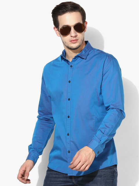 

Blue Solid Slim Fit Casual Shirt