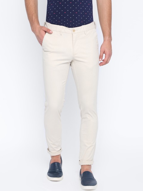 

Basics Men Off-White Tapered Fit Solid Regular Trousers