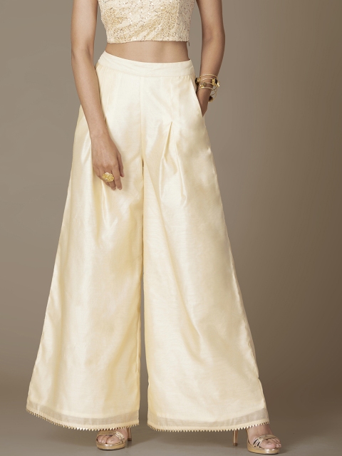 

Faballey Indya Women Cream-Coloured Solid Flared Palazzos