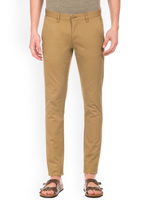 

Ruggers Men Brown Tapered Fit Solid Regular Trousers